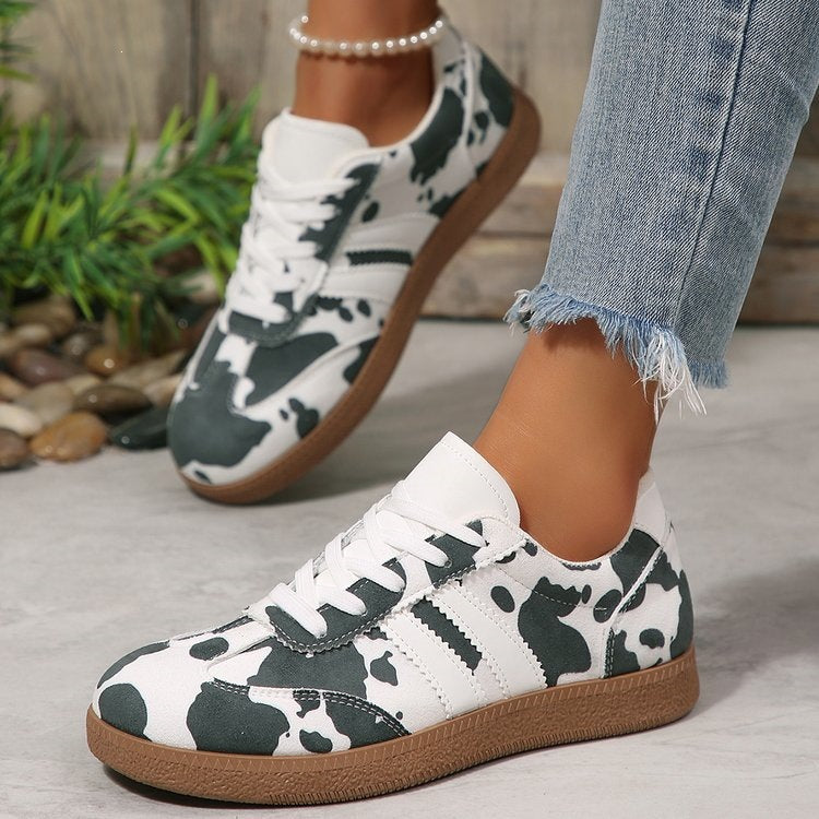 Damen Retro-Lowtop-Sneaker mit Kuhflecken-Print und gepolsterter Komfortsohle – Névara