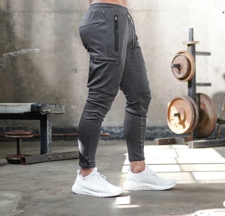 Herren Sportliche Jogginghose mit praktischen Reißverschlusstaschen und schmalem Schnitt Echoarchiv