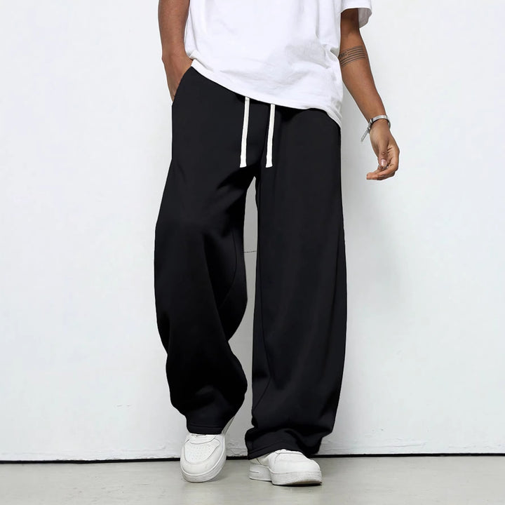 Herren Baggy-Jogginghose im Urban-Utility-Stil mit extra weitem Bein und sichtbarem Kordelzug Echo Archiv