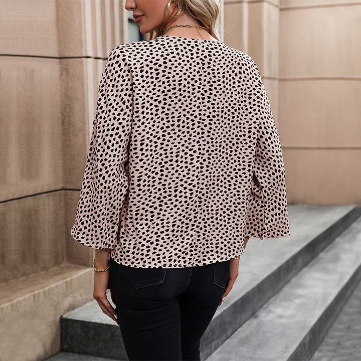 Damen V‑Ausschnitt Bluse mit lockerer Passform, 3/4-Ärmeln und dezentem Allover-Print – Élovi