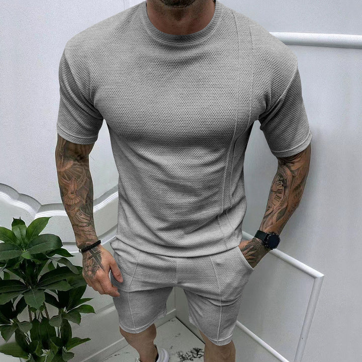 Herren atmungsaktives Fitness Set mit strukturierter Oberflächenbeschaffenheit Echoarchiv