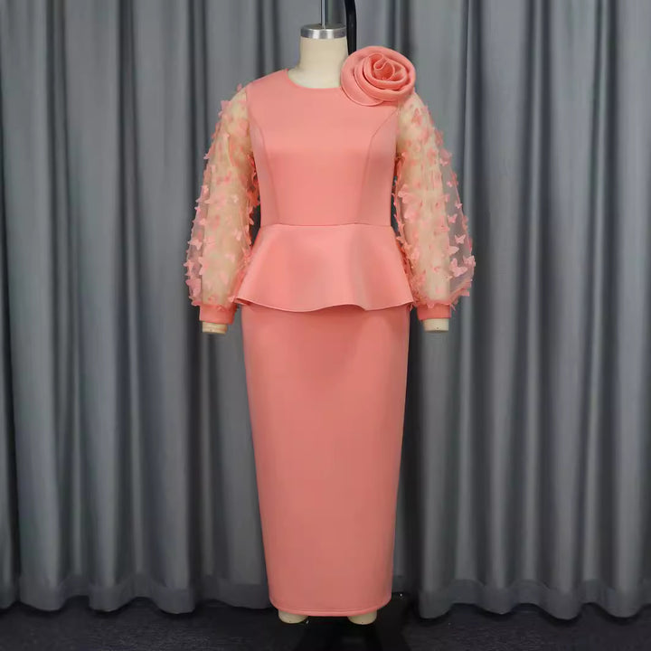 Damen Elegantes Kleid mit extravaganten Puffärmeln und floralem Detail Echo Archiv