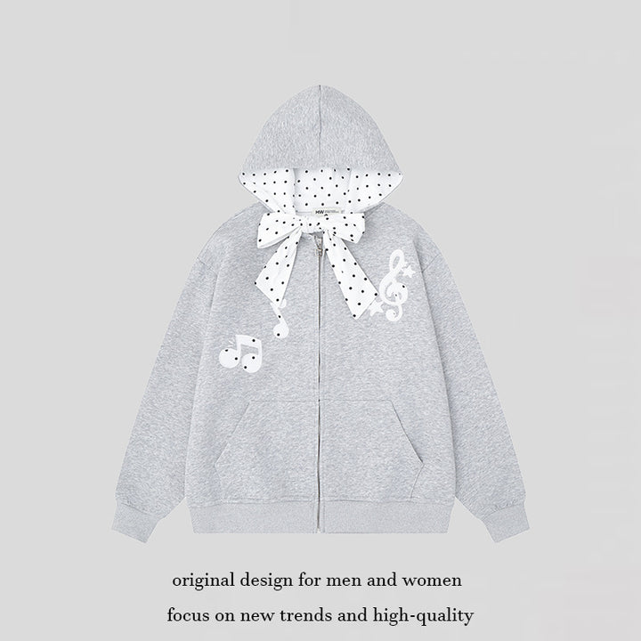 Damen Kapuzensweatjacke mit gepünktetem Kapuzenfutter, dekorativer Schleife und Notenmotiv Echoarchiv