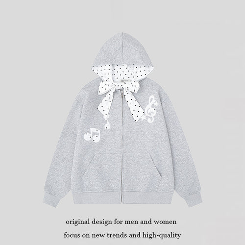 Damen Kapuzensweatjacke mit gepünktetem Kapuzenfutter, dekorativer Schleife und Notenmotiv Echoarchiv