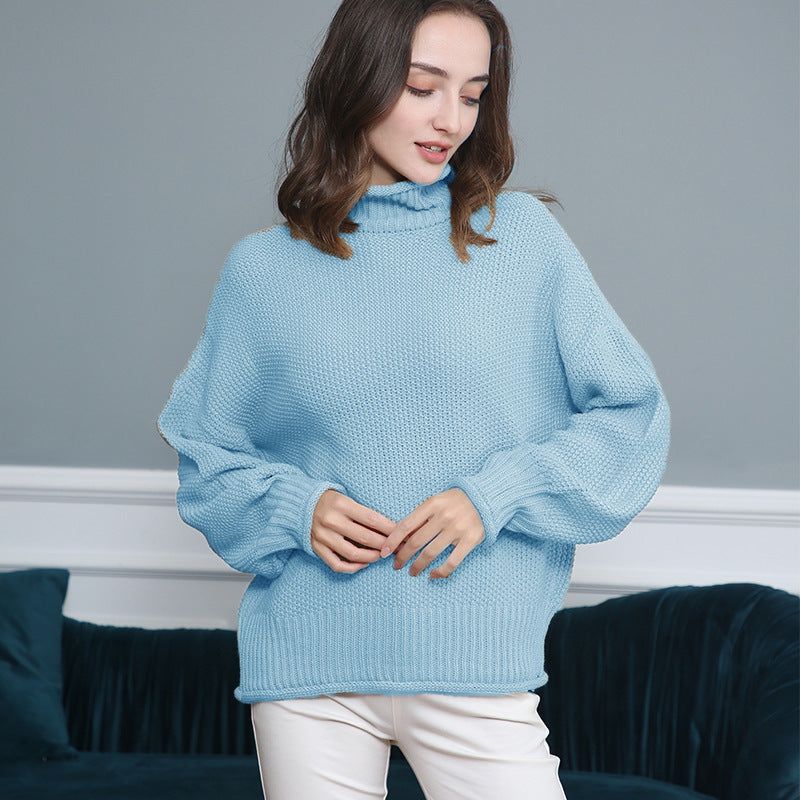 Damen Grobgestrickter Rollkragenpullover mit Ballonärmeln Echo Archiv