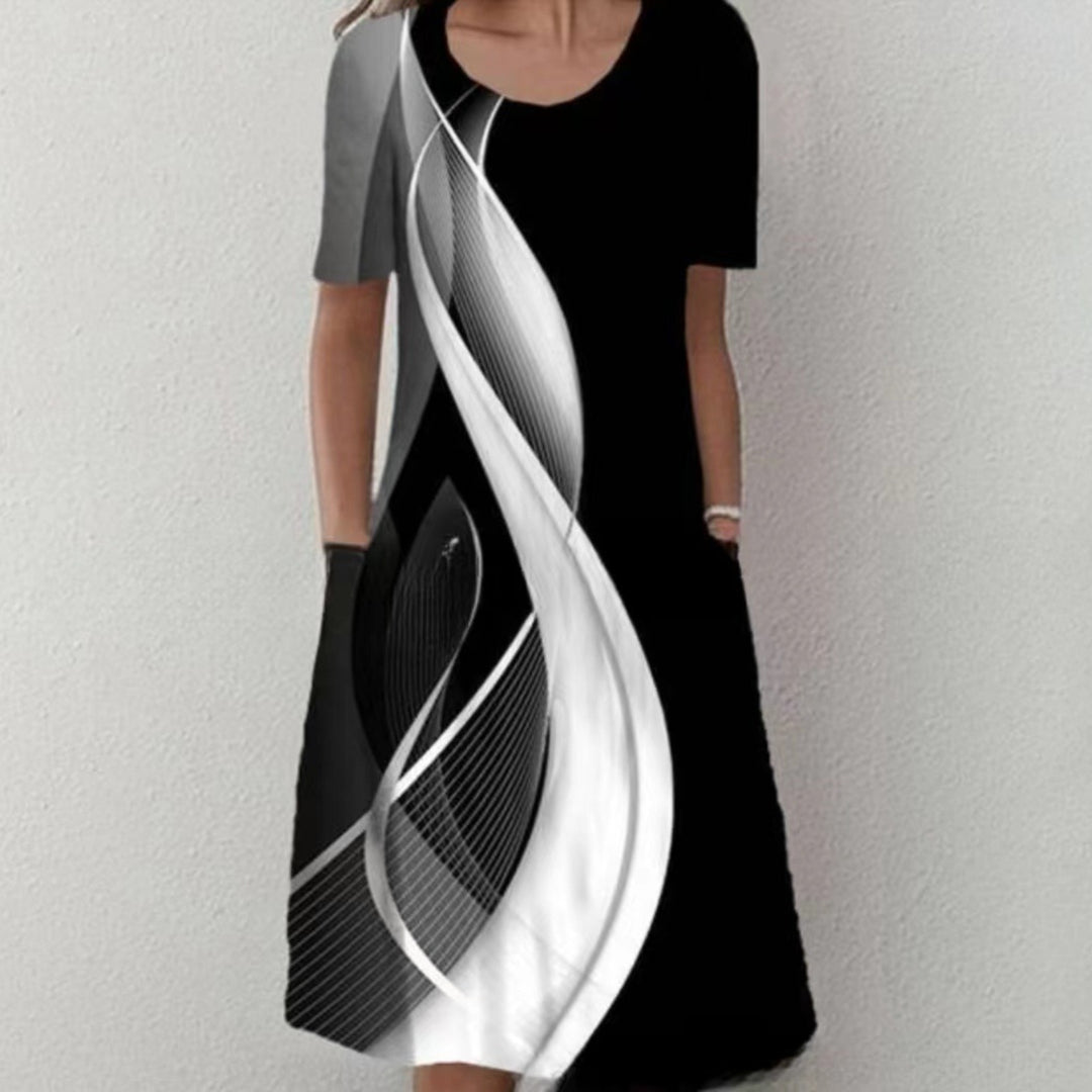 Damen Plissee Midi Kleid mit kurzen Ärmeln, seitlichen Taschen und floralem Saum – Élara
