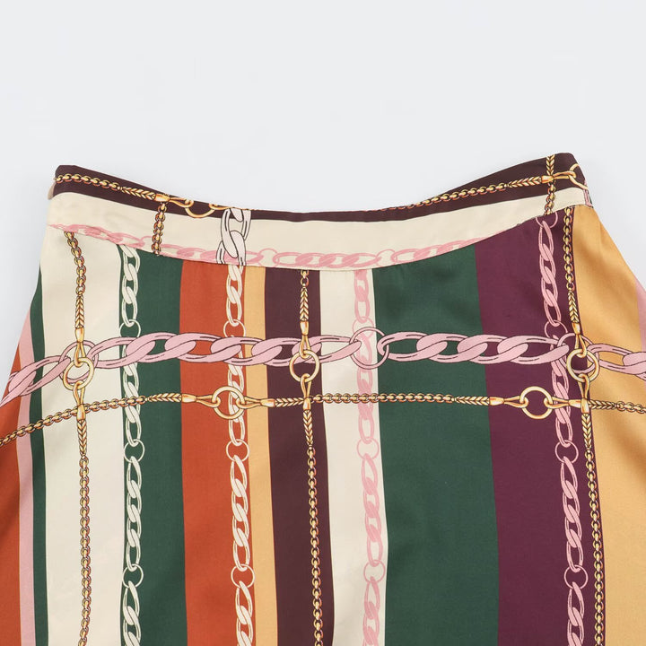 Damen Asymmetrischer Midirock mit Ketten‑Print und fließender Satin‑Optik Echoarchiv