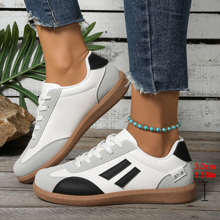 Damen Retro-Sneaker mit Gummisohle, leichtem Textilfutter und Komfortfußbett – Névara
