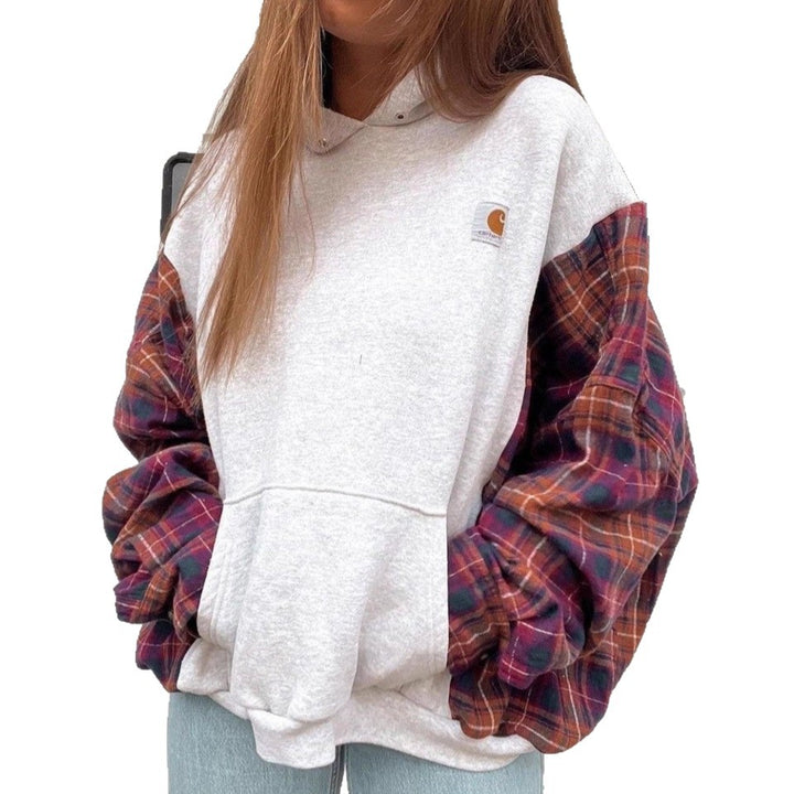 Damen nan oversized Kapuzenpullover mit karierten Flanellärmeln und Kängurutasche Echo Archiv