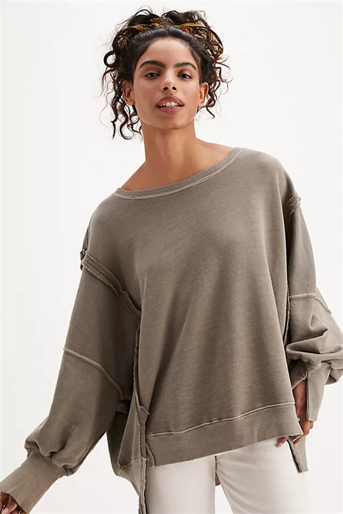Damen oversized Sweatshirt mit Ballonärmeln, offenen Saumnähten und seitlichen Schlitzen – Avérine