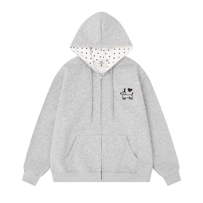 Damen Kapuzen-Sweatjacke mit gesticktem Dackel‑Motiv und gepunkteter Kapuzenfütterung Echoarchiv