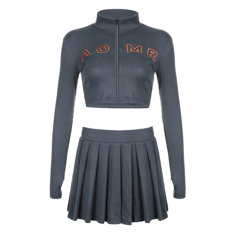Damen nan geripptes zweiteiliges Crop-Set mit Reißverschluss, Stehkragen und plissiertem Faltenrock Echo Archiv