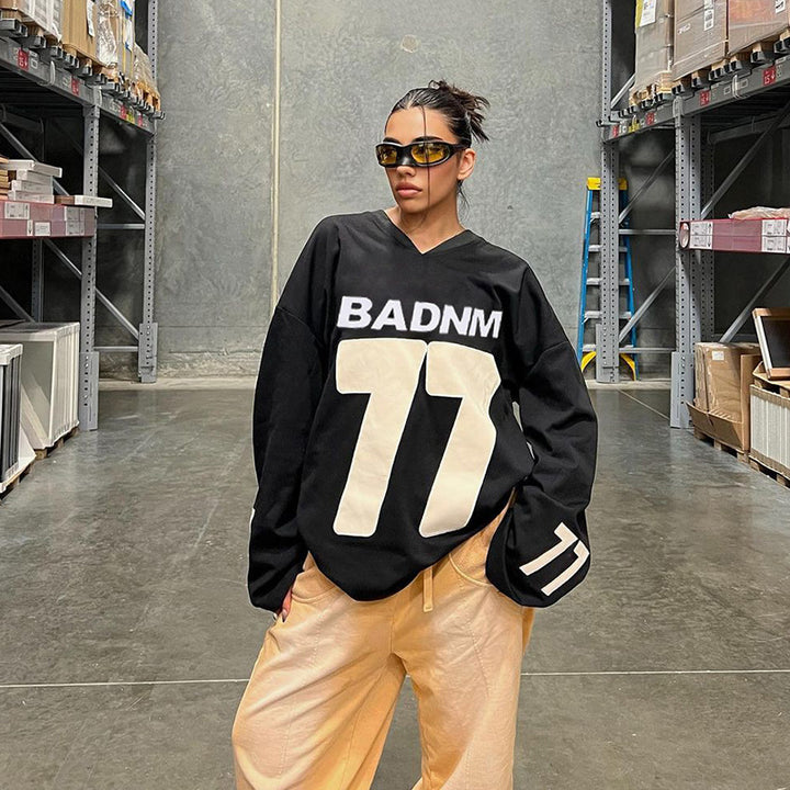 Damen Oversize Sport-Sweatshirt mit V-Ausschnitt und Statement-Print Echo Archiv