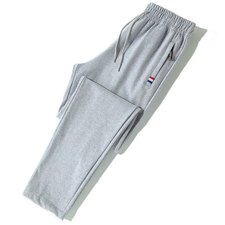 Herren Tapered-Jogginghose mit Tunnelzug, Reißverschlusstasche & Rippbündchen Echo Archiv