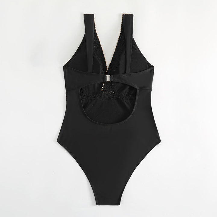 Damen eleganter Einteiler Badeanzug mit tiefem V-Ausschnitt und goldenen Akzenten Echo Archiv