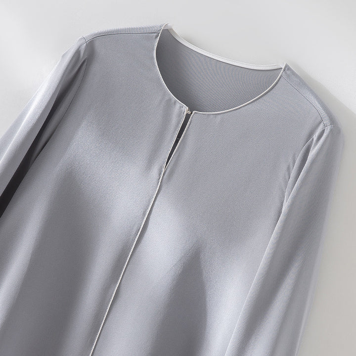 Damen Elegante seidenähnliche Bluse mit Kontrastpaspel und verlängerten Manschetten Echoarchiv