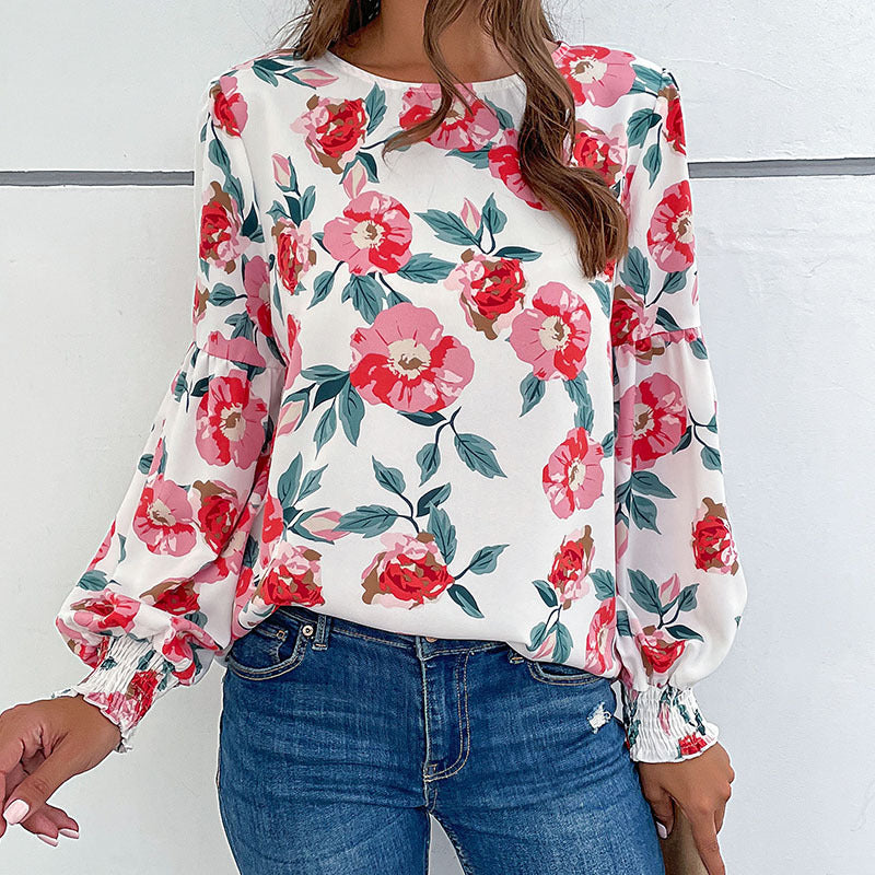 Damen Leichte Bluse mit großflächigem Blumenprint, Volumenärmeln und Smokbündchen Echoarchiv