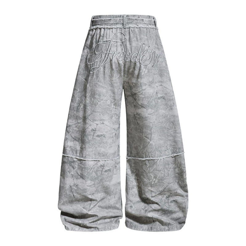 Damen weite Balloon-Jeanshose mit elastischem Bund, langen Zierbändern und Batik-Optik Echoarchiv
