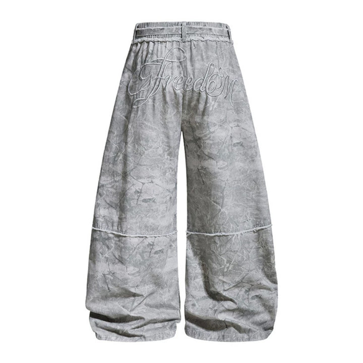 Damen weite Balloon-Jeanshose mit elastischem Bund, langen Zierbändern und Batik-Optik Echoarchiv