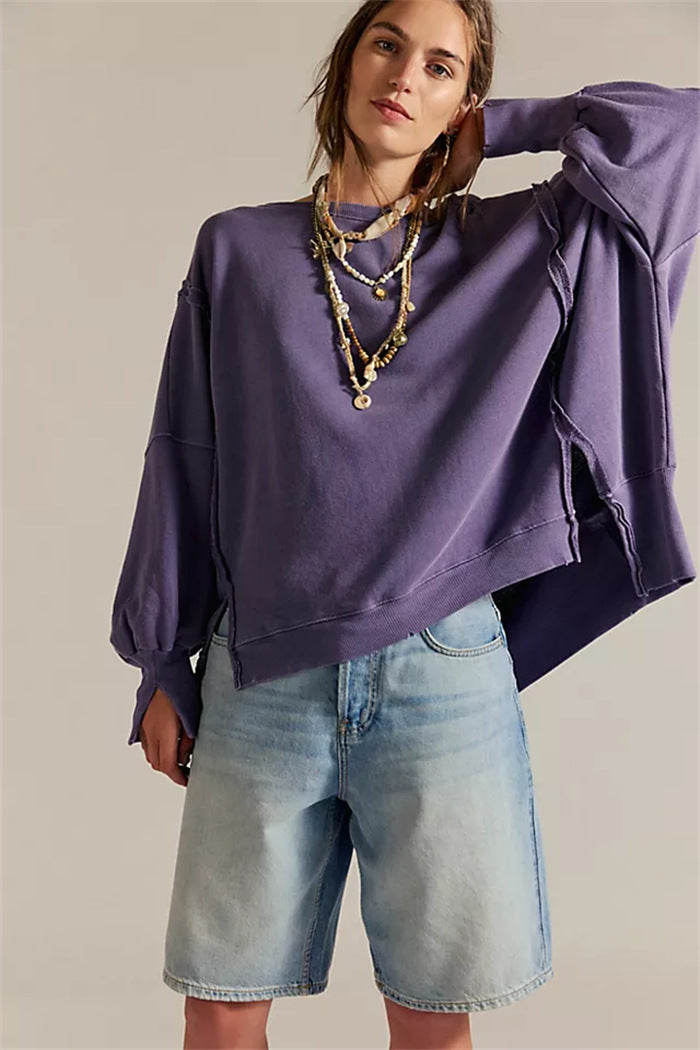 Damen oversized Sweatshirt mit Ballonärmeln, offenen Saumnähten und seitlichen Schlitzen – Avérine