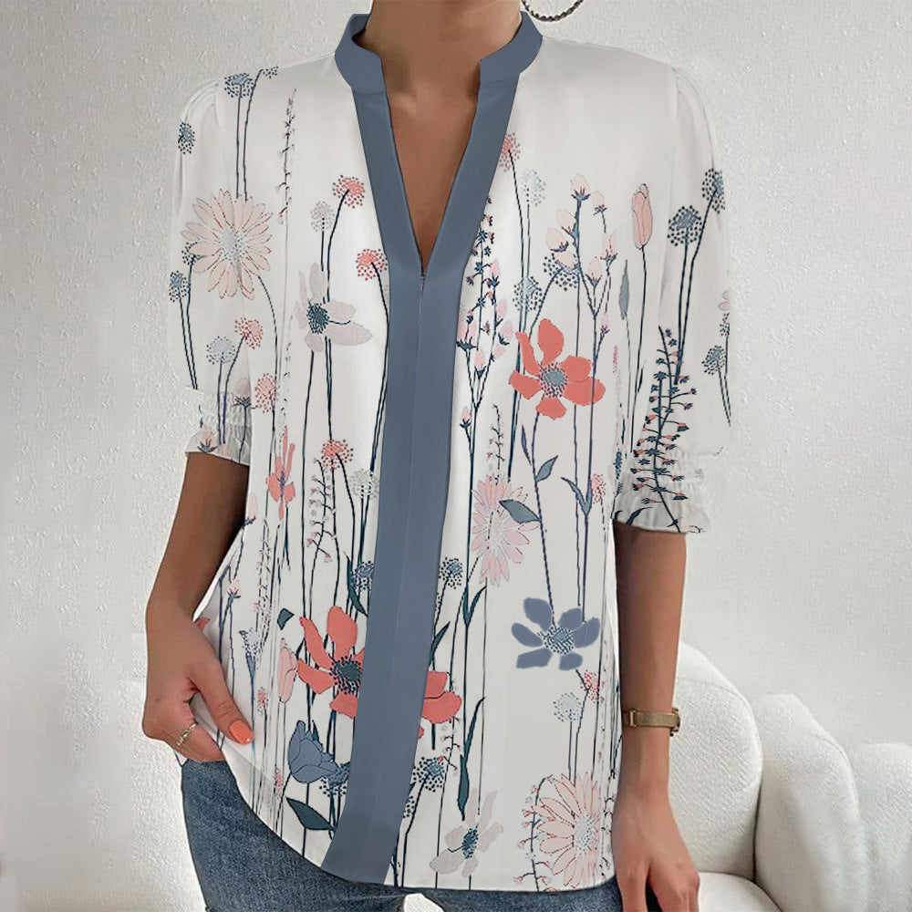 Damen Blumenprint Tunika-Bluse mit Stehkragen, geschlitzter V‑Blende und gerafften 3/4-Ärmeln – Élovi