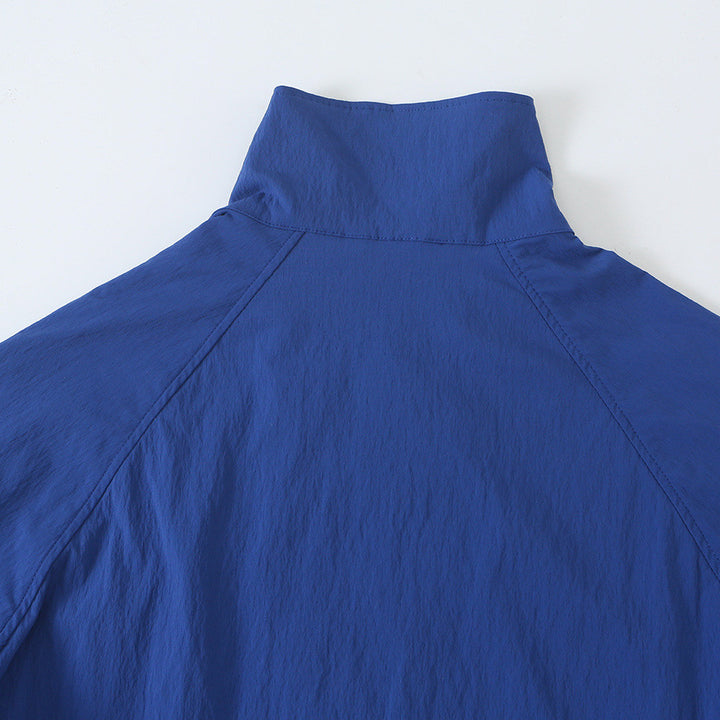 Damen Leichte Cropped Windjacke mit Stehkragen, Raglanärmeln und Tunnelzug Echoarchiv