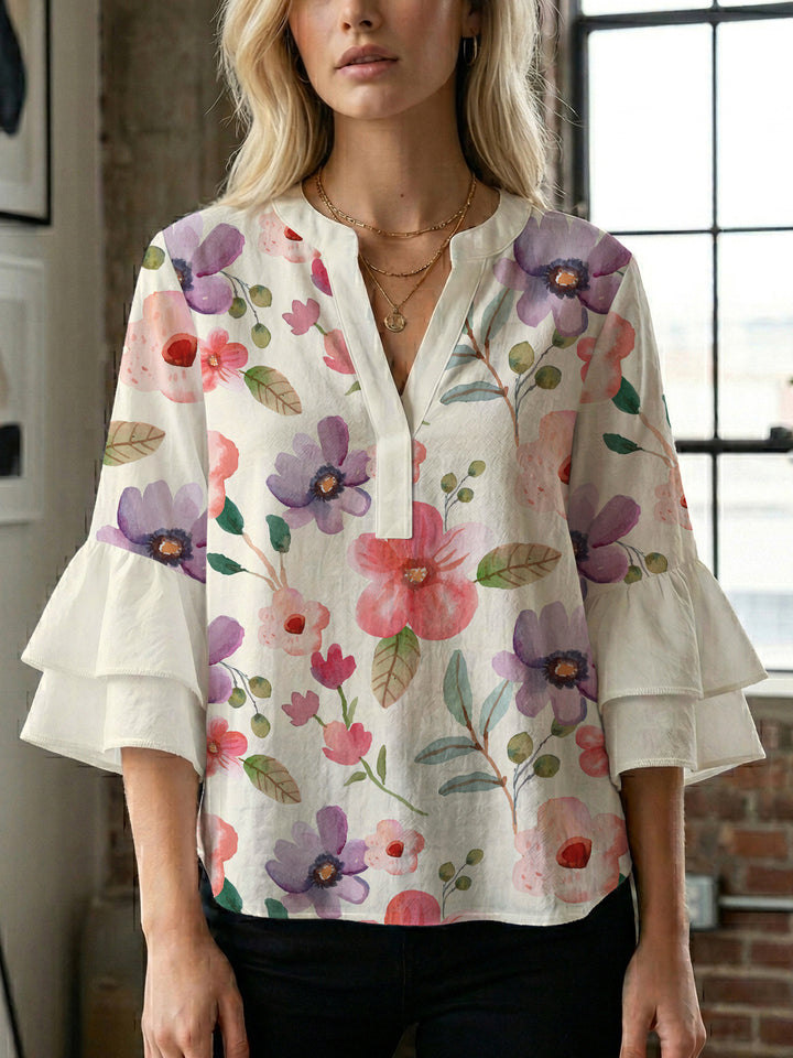 Damen elegantes Oberteil mit voluminösen Rüschensäumen und floralem Design Echo Archiv
