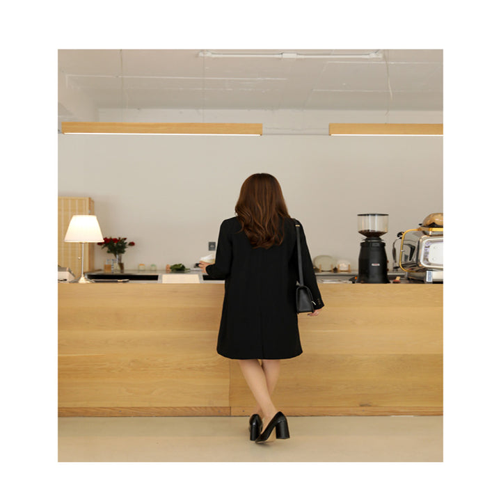 Damen Knieumspielender Einreihiger Wollmix-Longmantel im minimalistischen Tailoring Echoarchiv