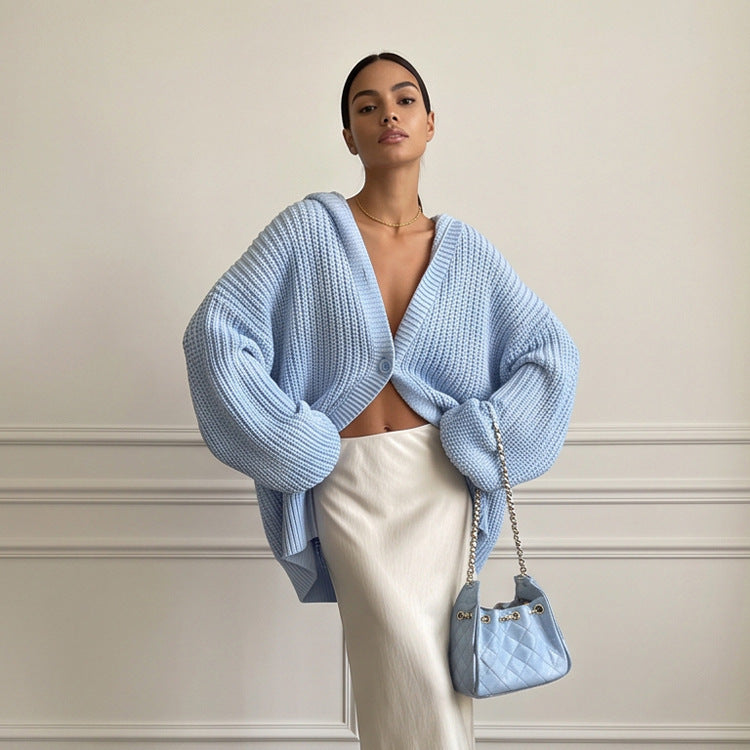 Damen Oversized Kapuzen-Strickcardigan mit Ballonärmeln und Knopfleiste Echoarchiv