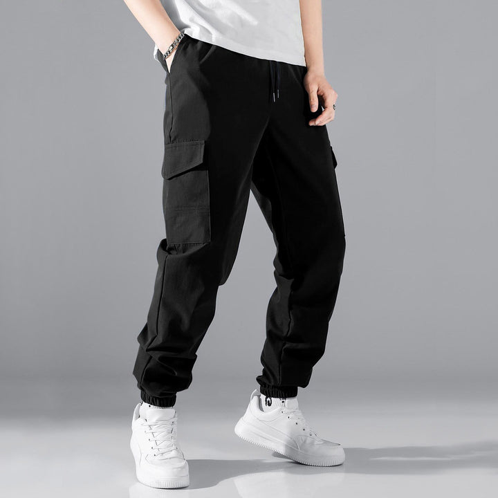 Herren Technische Cargo-Jogginghose im Utility‑Stil mit Klappentaschen & elastischen Knöchelbündchen Echo Archiv