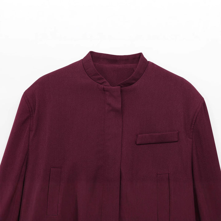 Damen kurze Stehkragen-Blousonjacke mit verdeckter Frontleiste, taillierter Rippbund-Details und dekorativen Paspeltaschen – Célinea