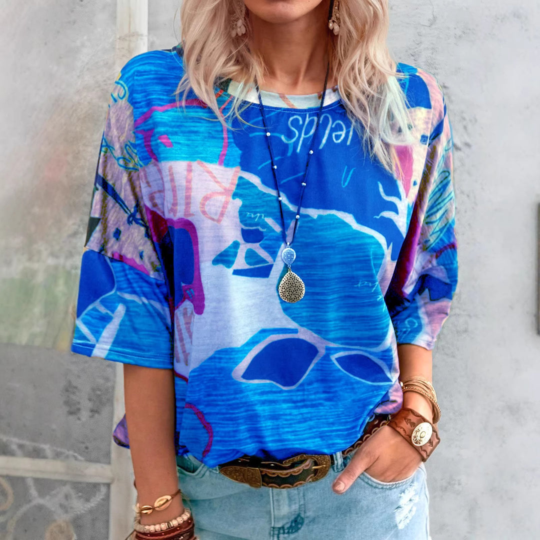 Damen Lockere Viskose Druckbluse mit halblangen Ärmeln und Rundhalsausschnitt – Élovi