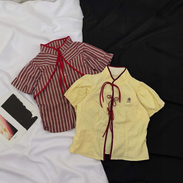 Damen Modische Bluse mit hochgeschlossenem Kragen und dekorativen Rüschen Echo Archiv