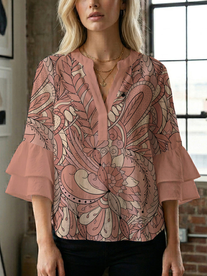 Damen elegantes Oberteil mit voluminösen Rüschensäumen und floralem Design Echo Archiv