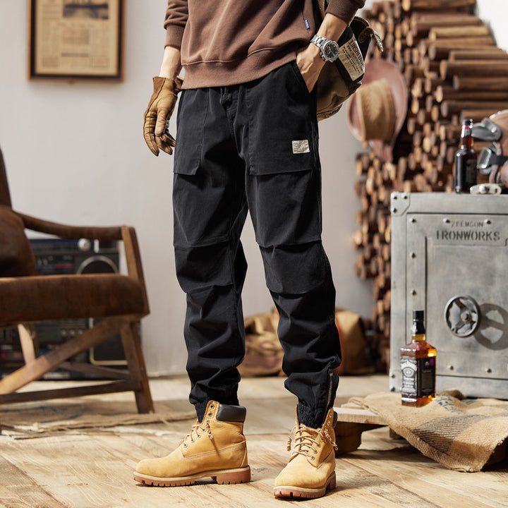 Herren Canvas‑Utility‑Jogger mit verstärkten Kniepaneelen, Klapptaschen und elastischem Knöchelsaum Echo Archiv