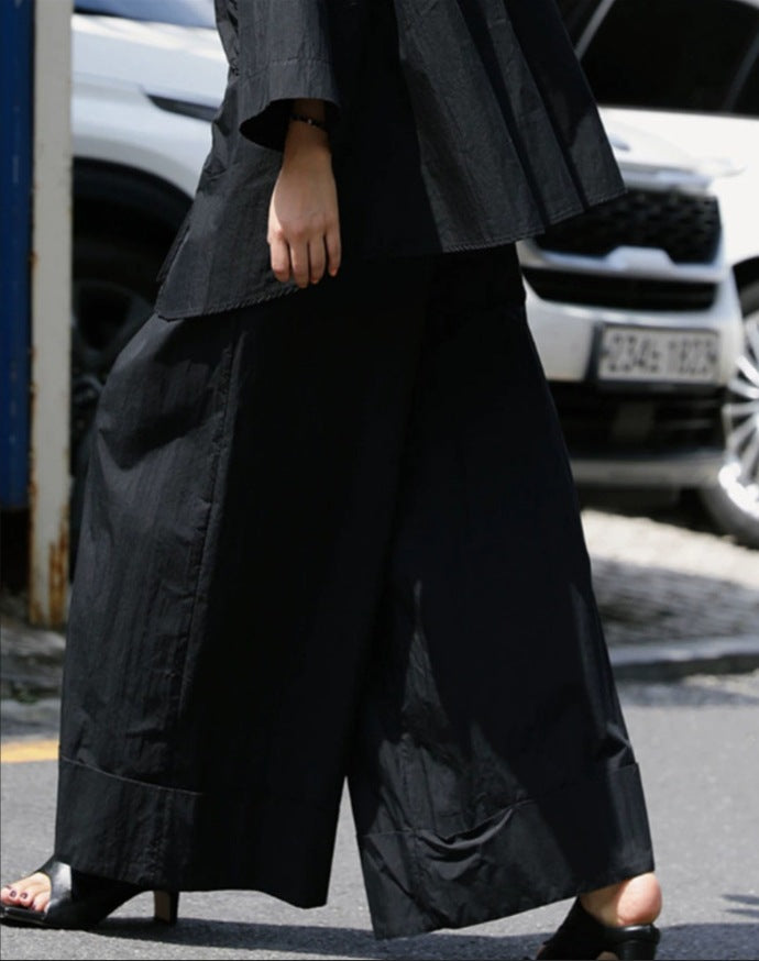 Damen Weite Palazzo-Hose mit hohem Bund und breitem Saum Echoarchiv