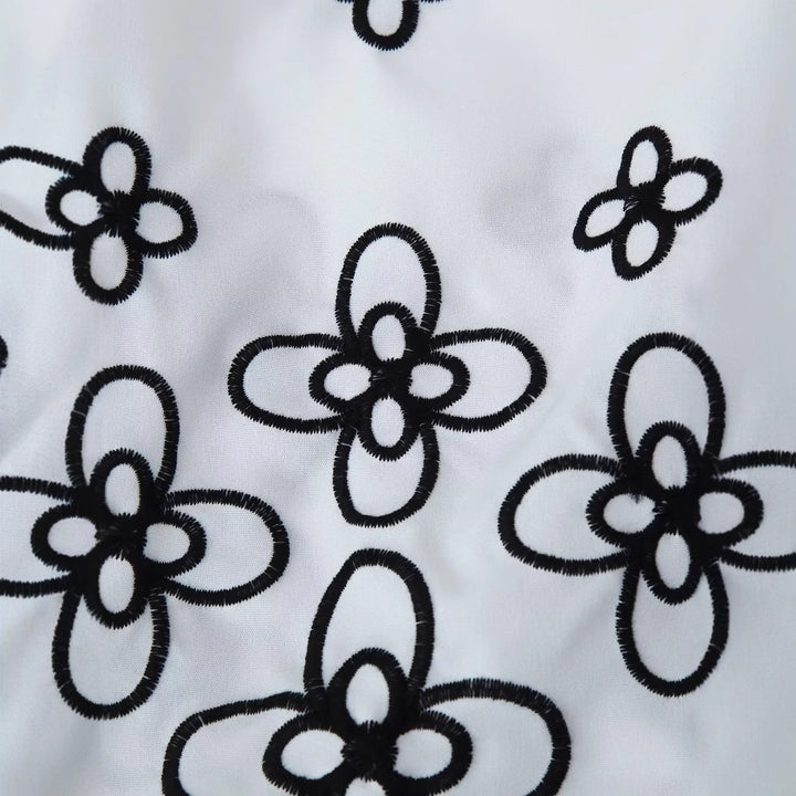 Damen bestickte Chiffon-Bluse mit floralem Saum, Volumenärmeln und Hemdkragen – Élovi