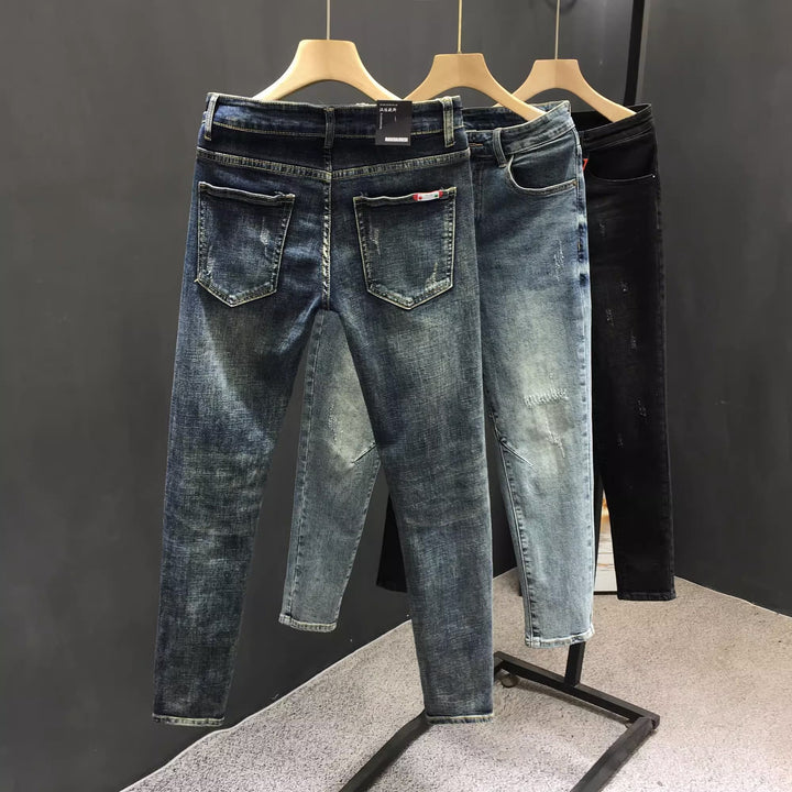 Herren Skinny Jeans mit distressed Details und modernem Schnitt Echoarchiv