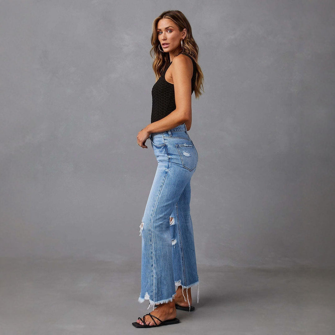 Damen nan hochgeschnittene ausgestellte Destroyed-Jeans mit Knieausfransungen und rohem Saum Echo Archiv