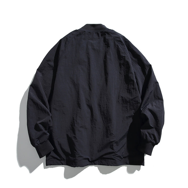 Unisex Weitgeschnittene Leichte Übergangsjacke mit V-Ausschnitt und Druckknopfleiste Echo Archiv