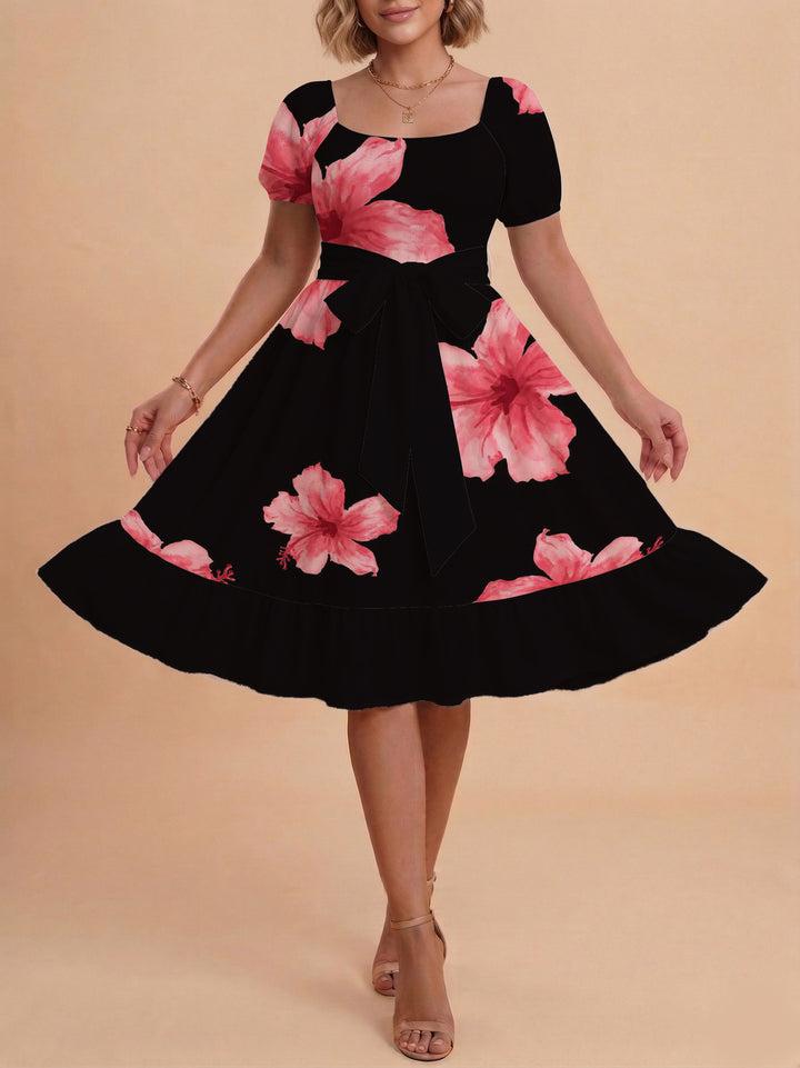 Damen Kleid mit tailliertem Schnitt und verspieltem Blumenmuster Echo Archiv