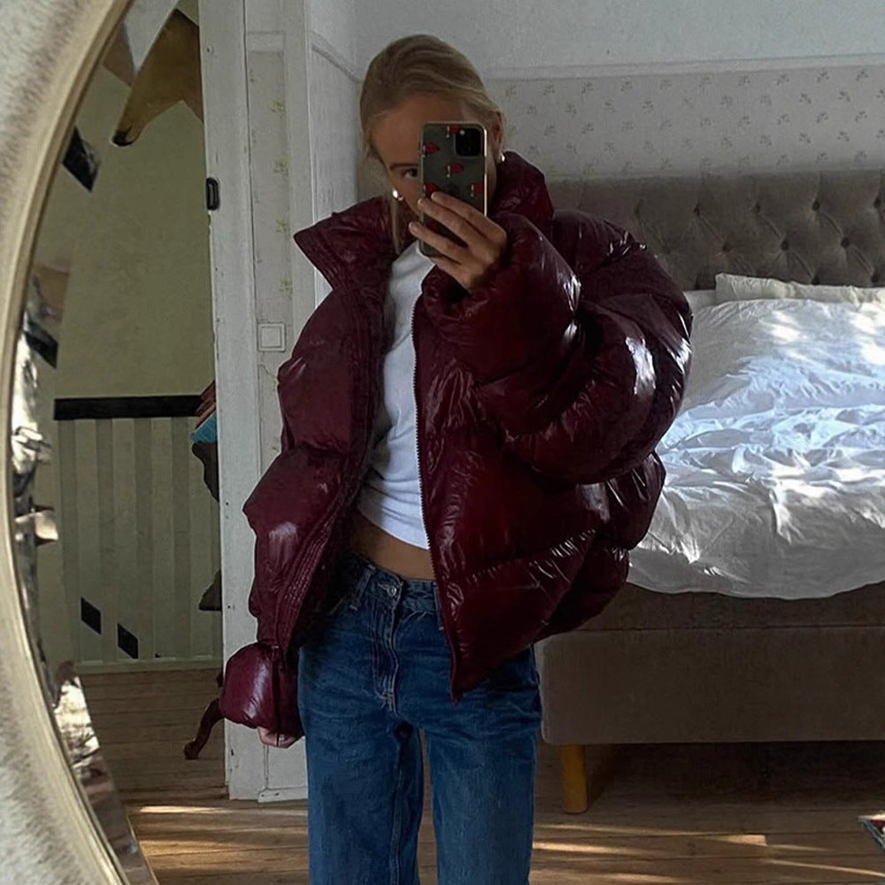 Damen Glänzende Oversize-Steppjacke mit Kapuze und hohem Stehkragen Echoarchiv