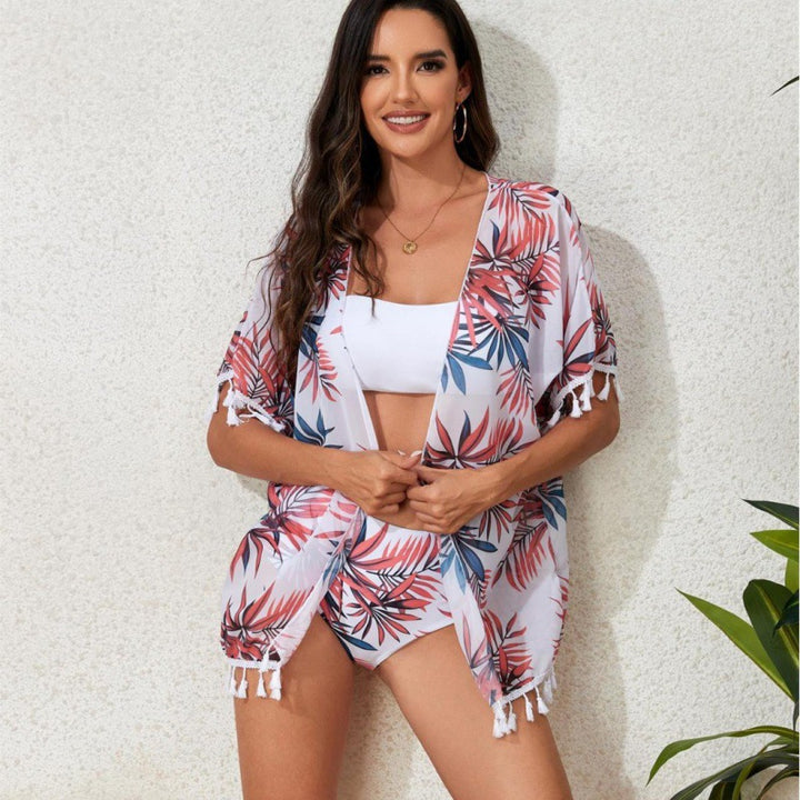 Damen Strandkleid mit floralem Design und fransenverziertem Überwurf Echo Archiv