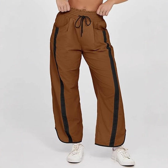 Damen relaxte Trackpants mit seitlichem Kontraststreifen, elastischem Smokbund und Eingrifftaschen – Avélisse