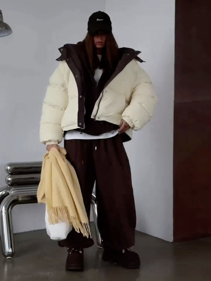 Damen Kurze Oversize Steppjacke mit hohem Kragen und wattierter Fütterung Echoarchiv