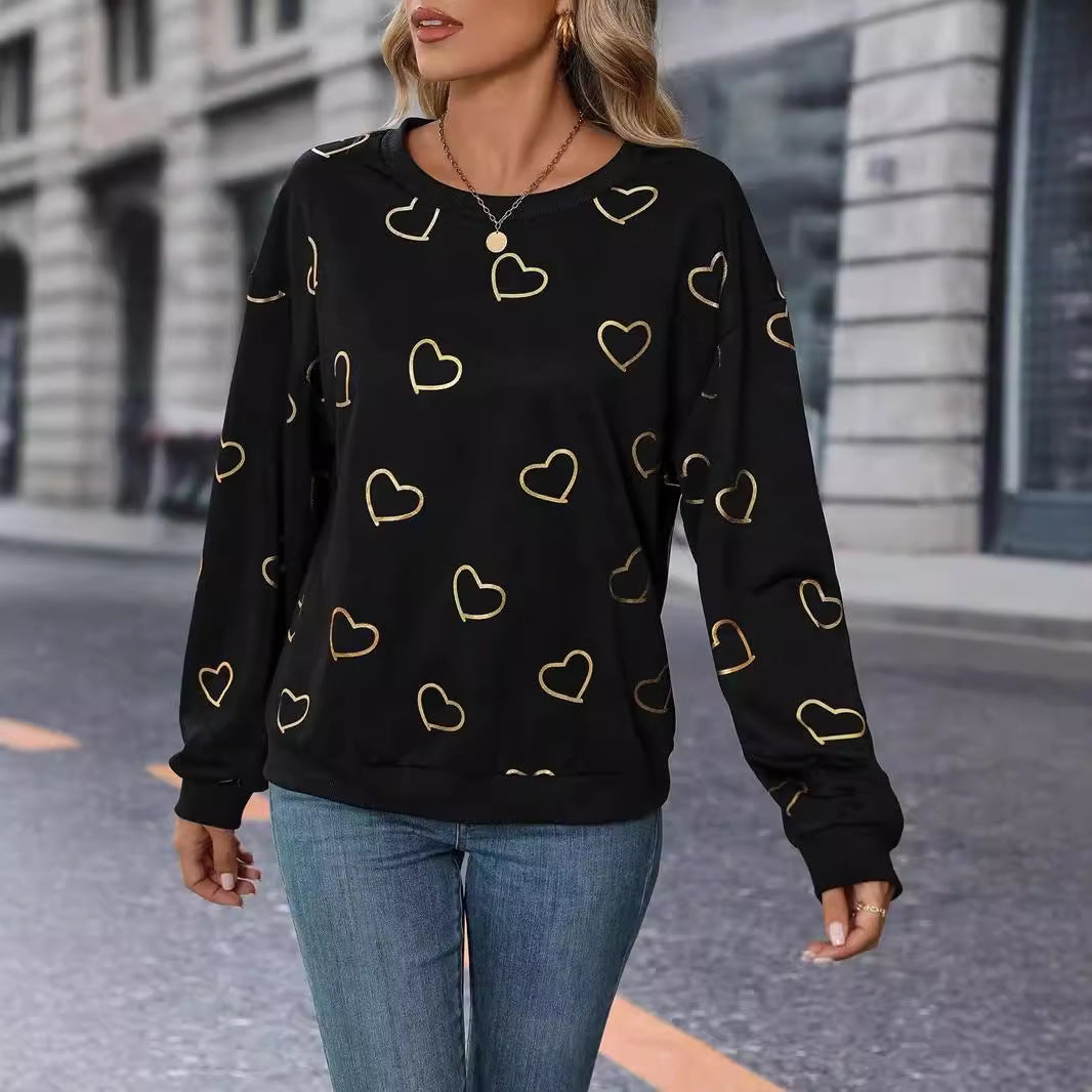 Damen nan lockeres Herzprint-Sweatshirt mit Rundhalsausschnitt und Rippbündchen Echo Archiv