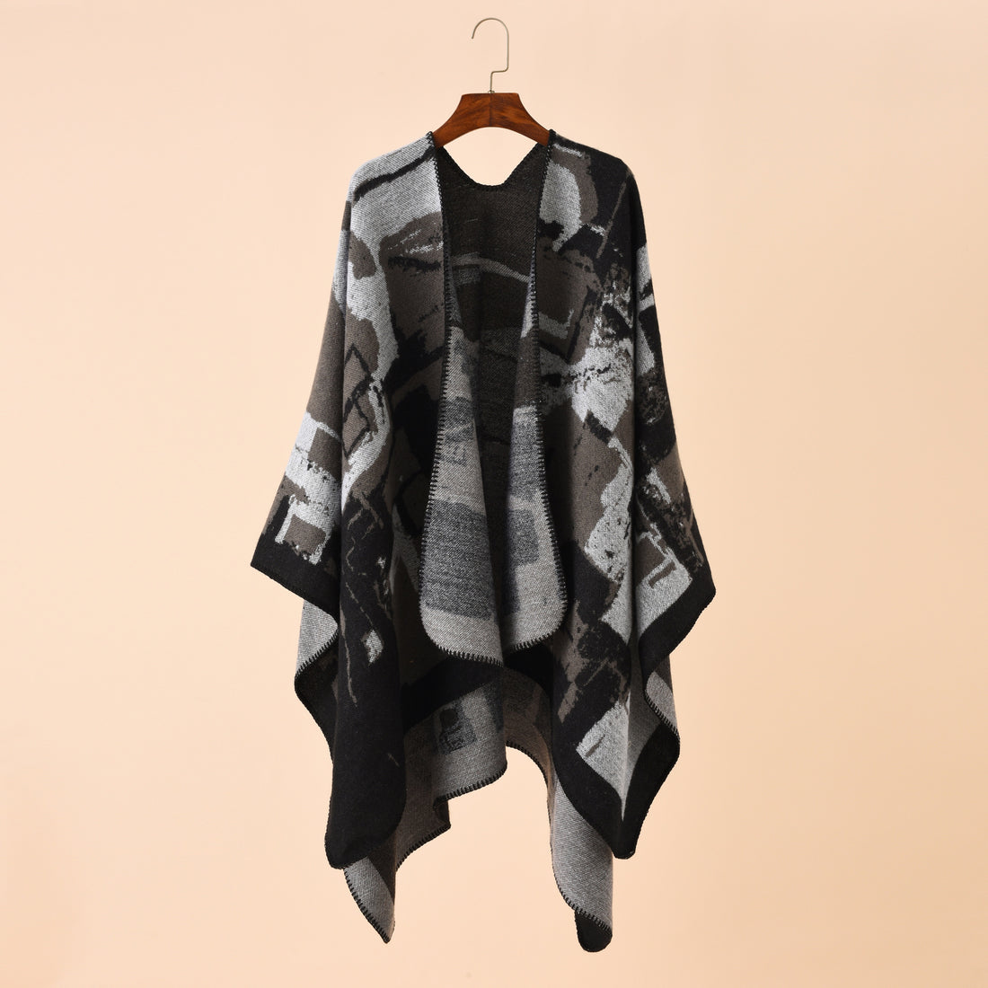 Damen Oversize-Umhangruana aus Wollmix mit abstraktem Jacquard und Zierstichkante – Célinea