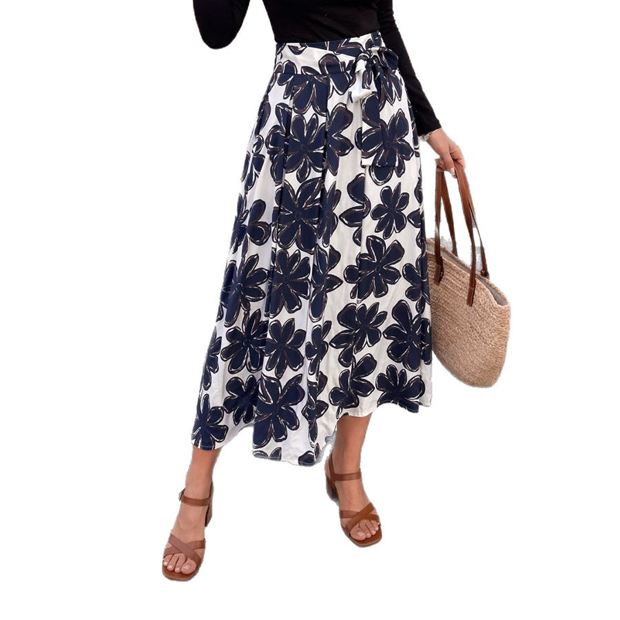 Damen Midirock im A‑Linien‑Schnitt mit großblumigem Print, hohem Bund und Eingrifftaschen – Avérine