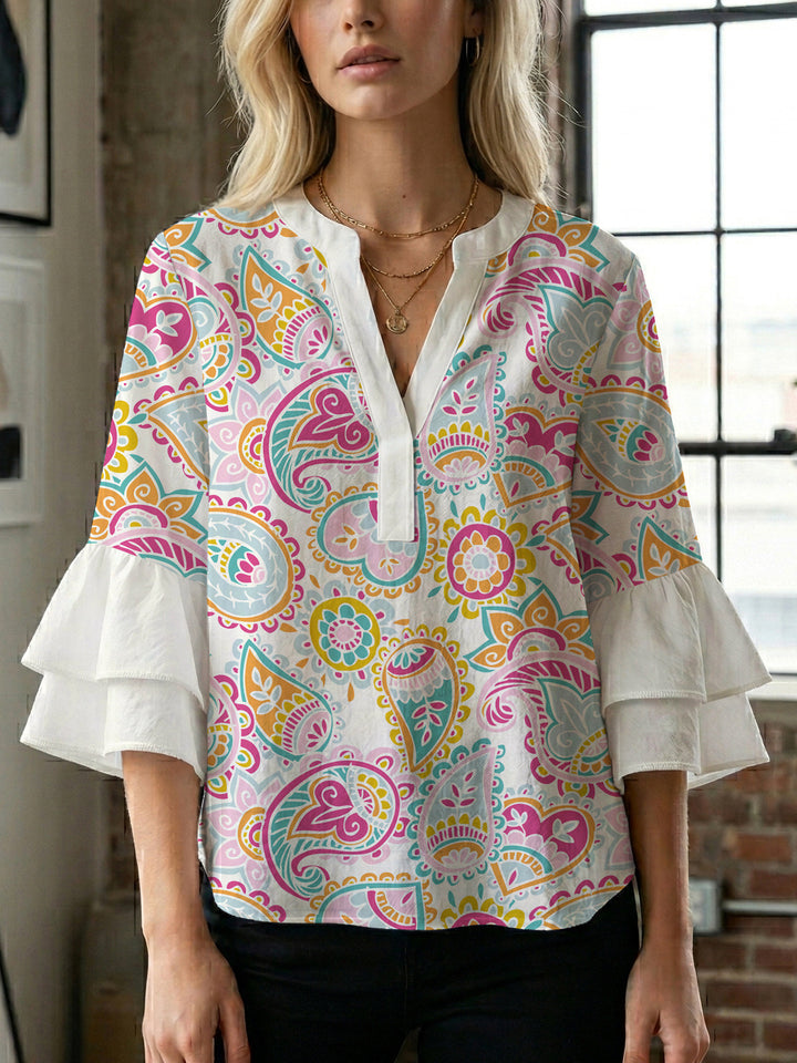 Damen Bluse mit voluminösen Flügelärmel und intensivem Blattmuster Echo Archiv