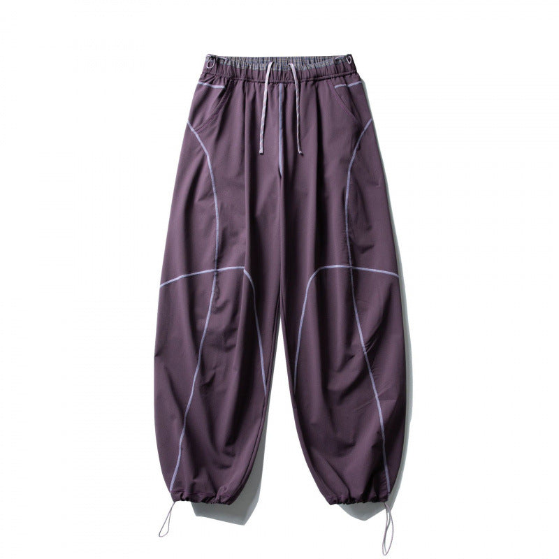 Unisex Locker geschnittene Tech-Jogginghose mit elastischem Bund, markanten Flatlock-Nähten und Kordelzug Echo Archiv